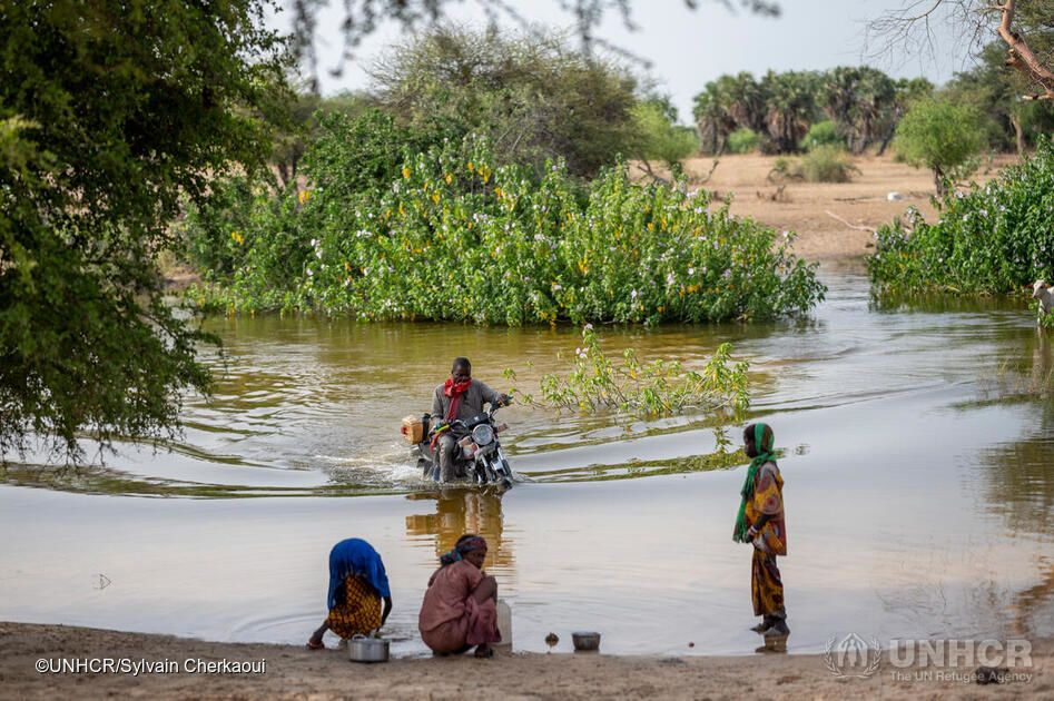  A road made impassable by floodwaters near the Kafia site for displaced people in Baga Sola, Chad.