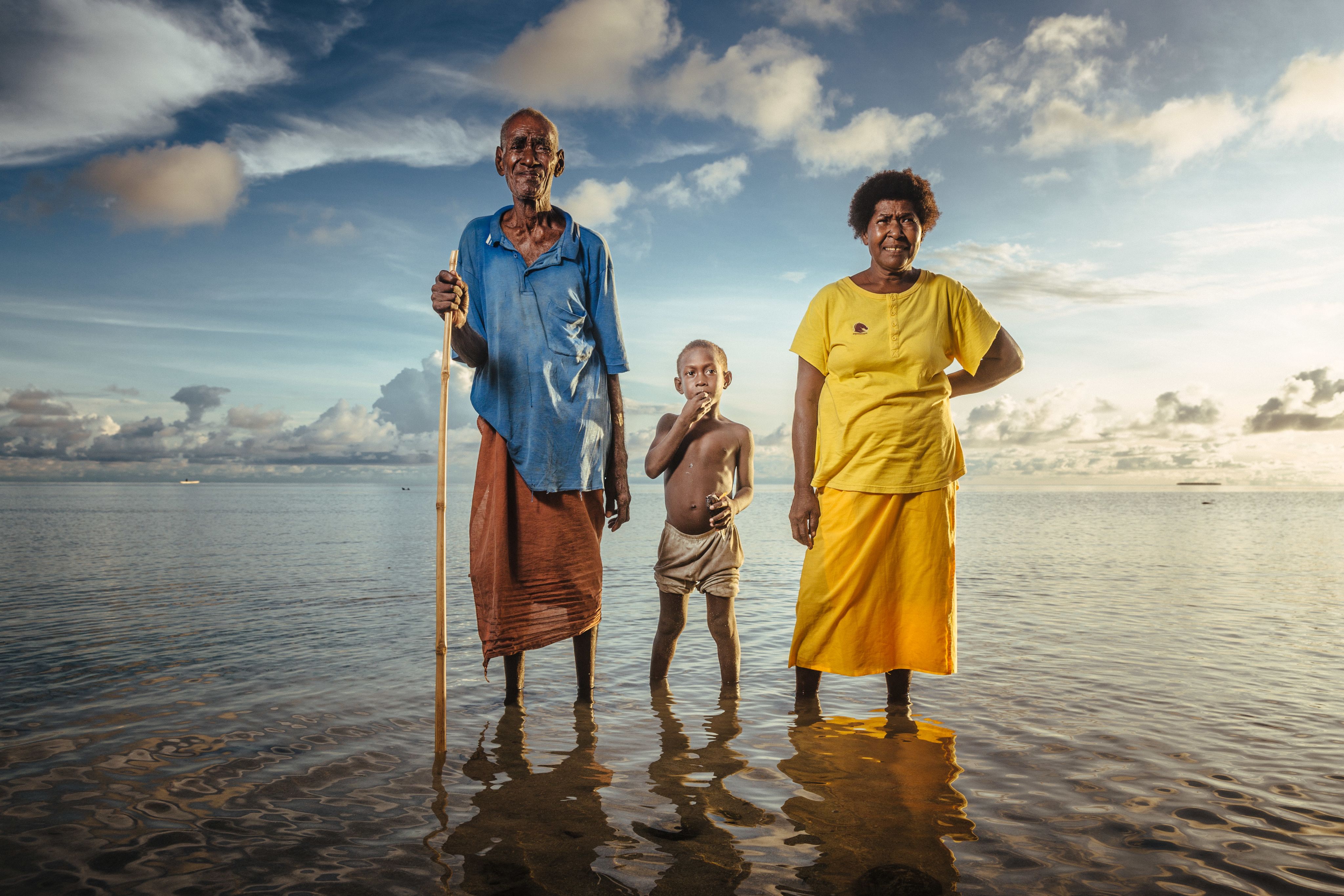 This family from Yesila atolln in Papua New Guinea's Carteret Islands,has already had to move inland due to the sea eroding their gardens and livelihoods.
