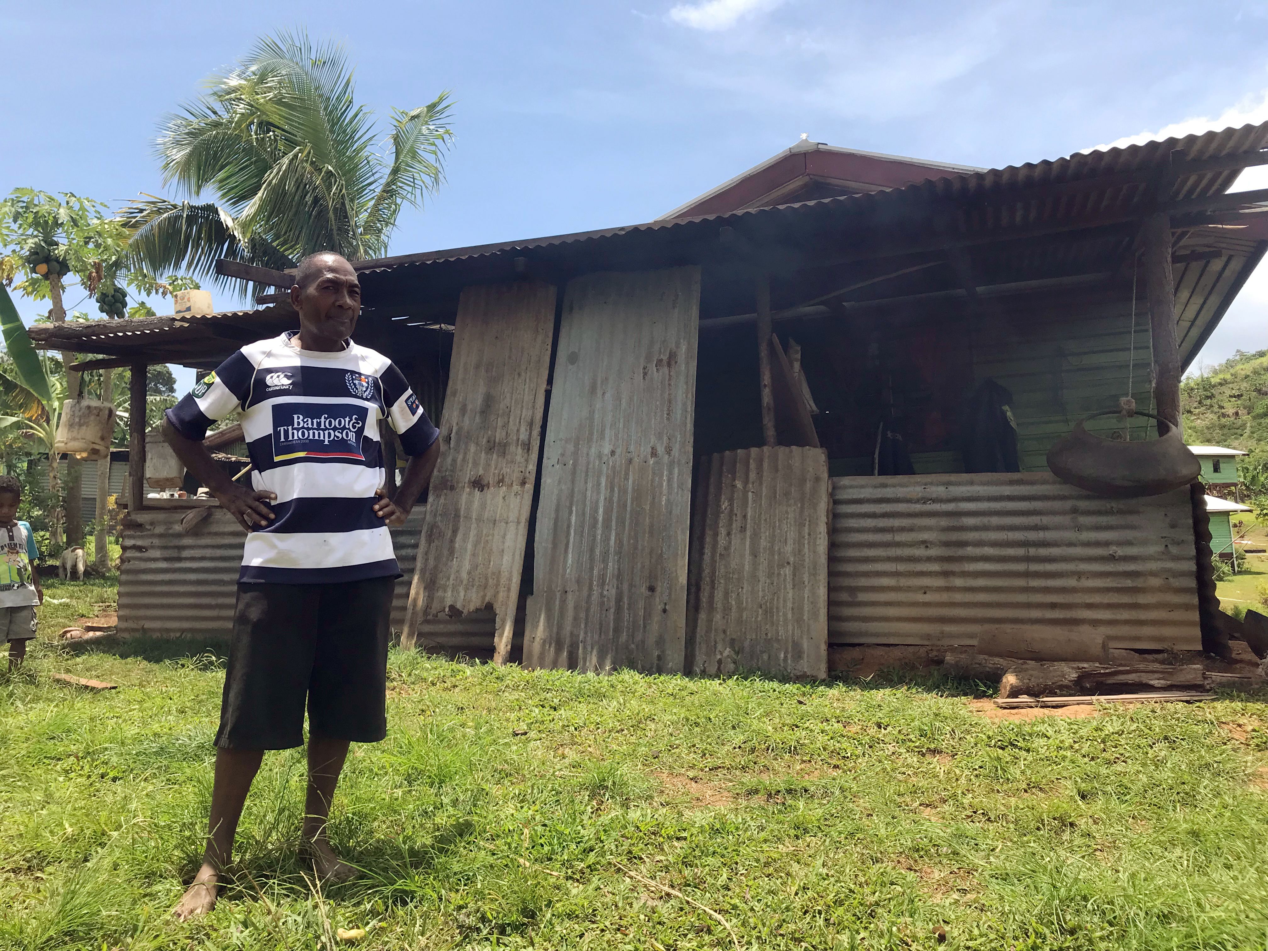 Sailosi Ramatu, once mayor of Vunidogoloa, in front of a house on the Fiji island Ono in 2017